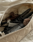 DANS LE SAC - LONGUE POCHETTE MATELASSÉ POUR LES OUTILS COIFFANTS