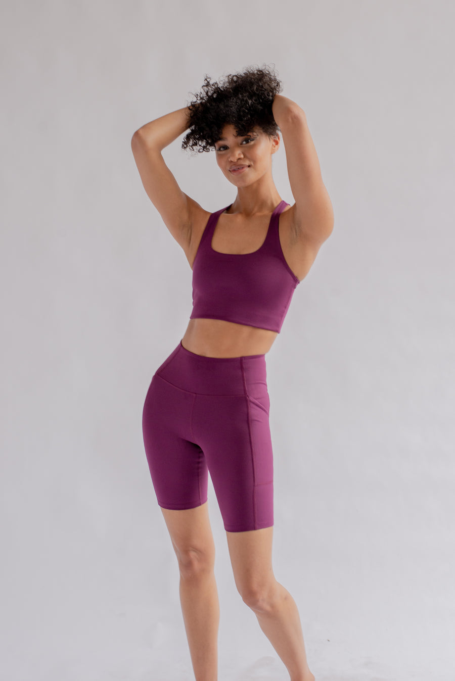 GIRLFRIEND COLLECTIVE - HIGH RISE BIKE SHORT - PLUM
